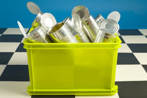 Recyclable materials being sorted for business waste management in Paddington